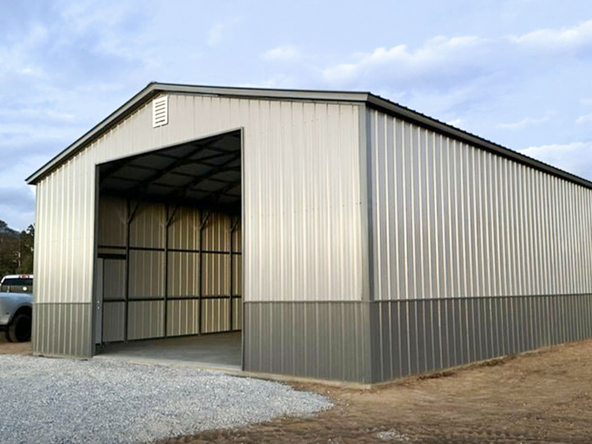 Side angle of a metal garage with wainscoting